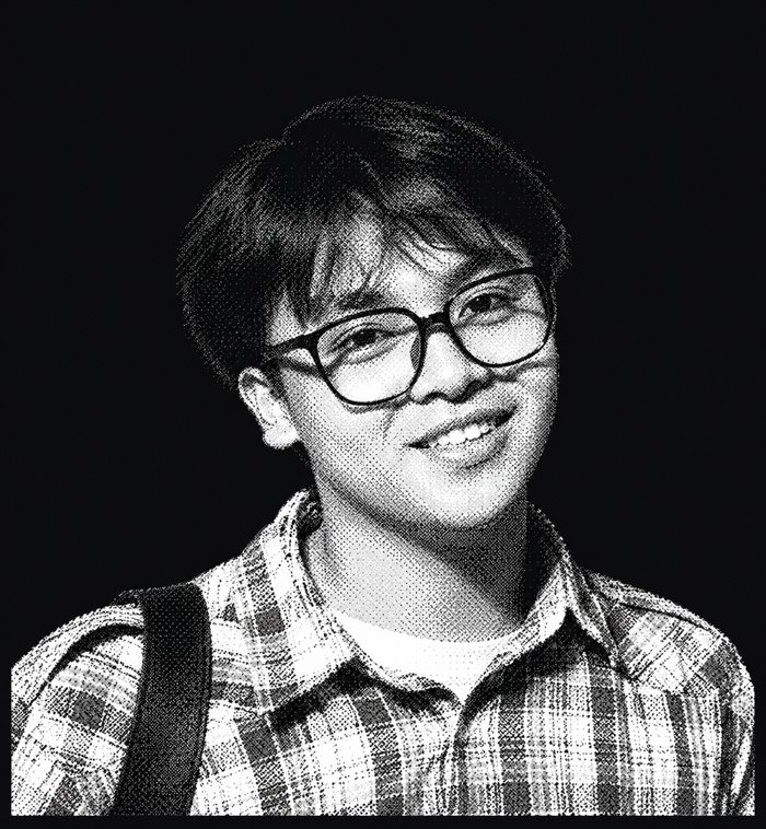 Kim Maturan smiling, in black-and-white halftone